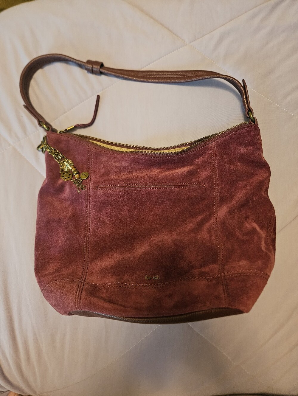 The Sak Burgundy Shoulder Bag Zip Top Outer/Inner Pockets Bag Charm Gold